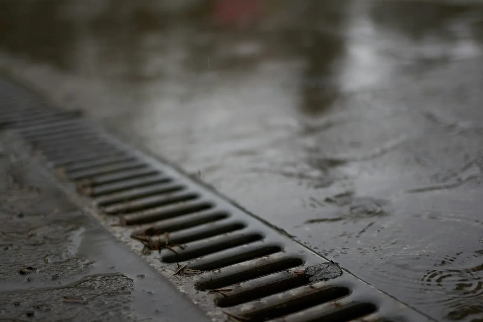 Linear channel drain on a wet driveway