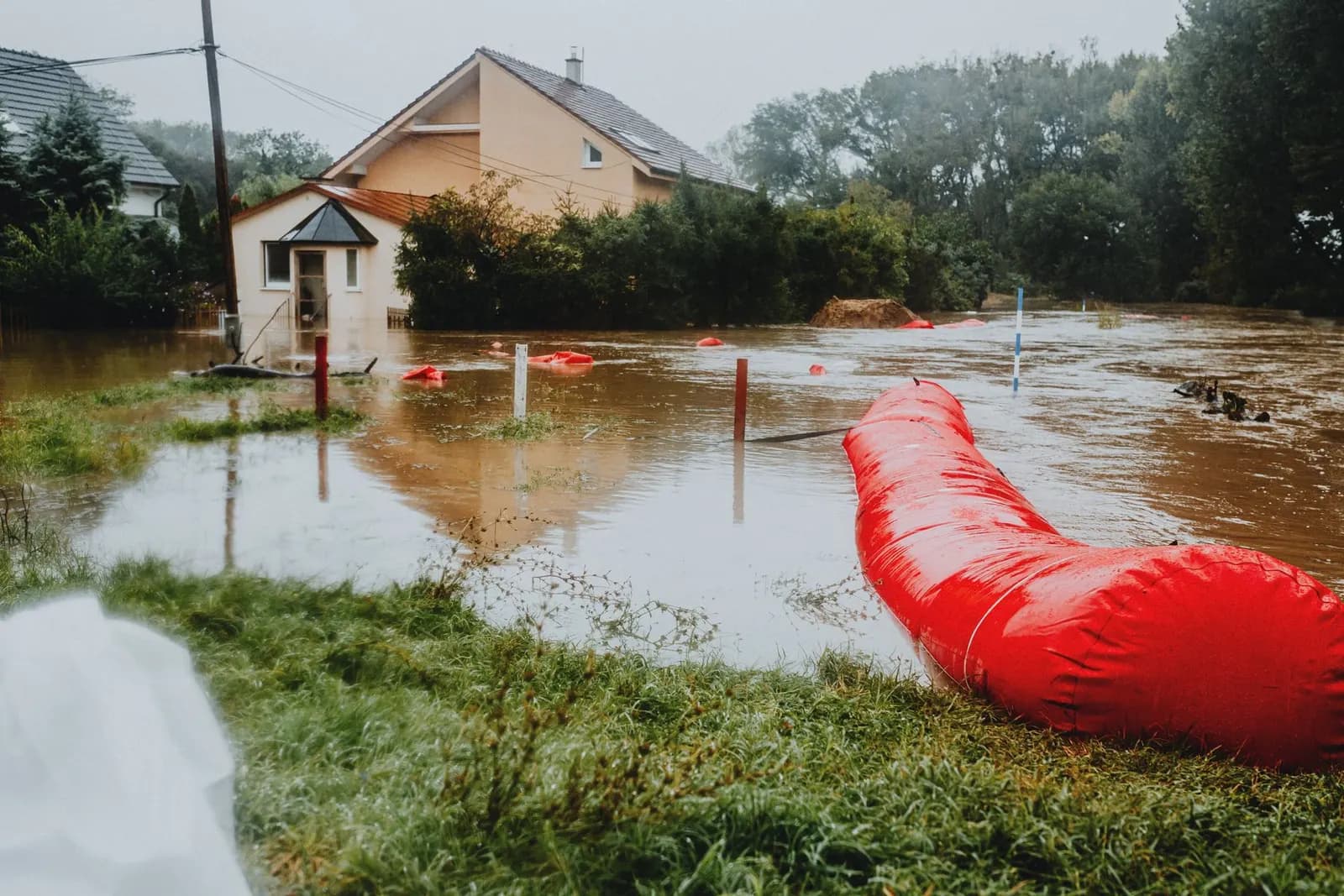Flooded garden with a flood barrier in place